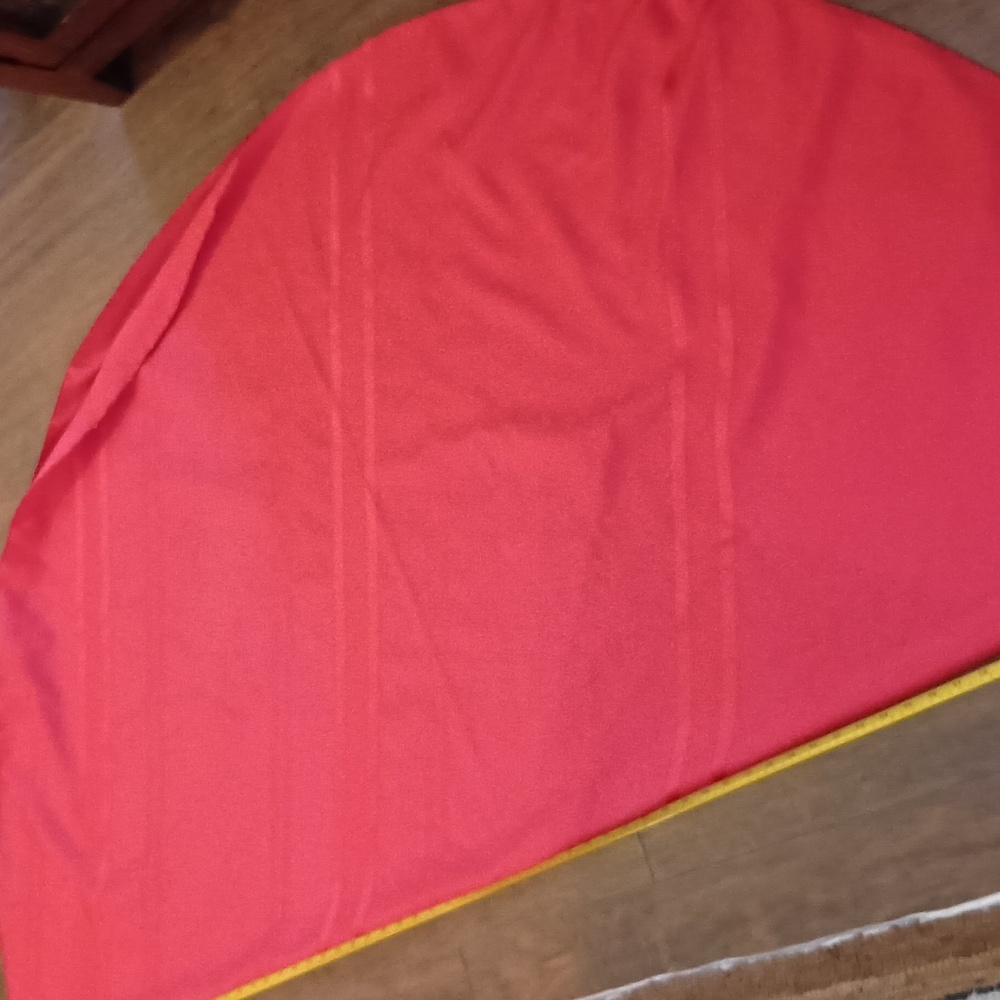 Round red table cloth.  60" across